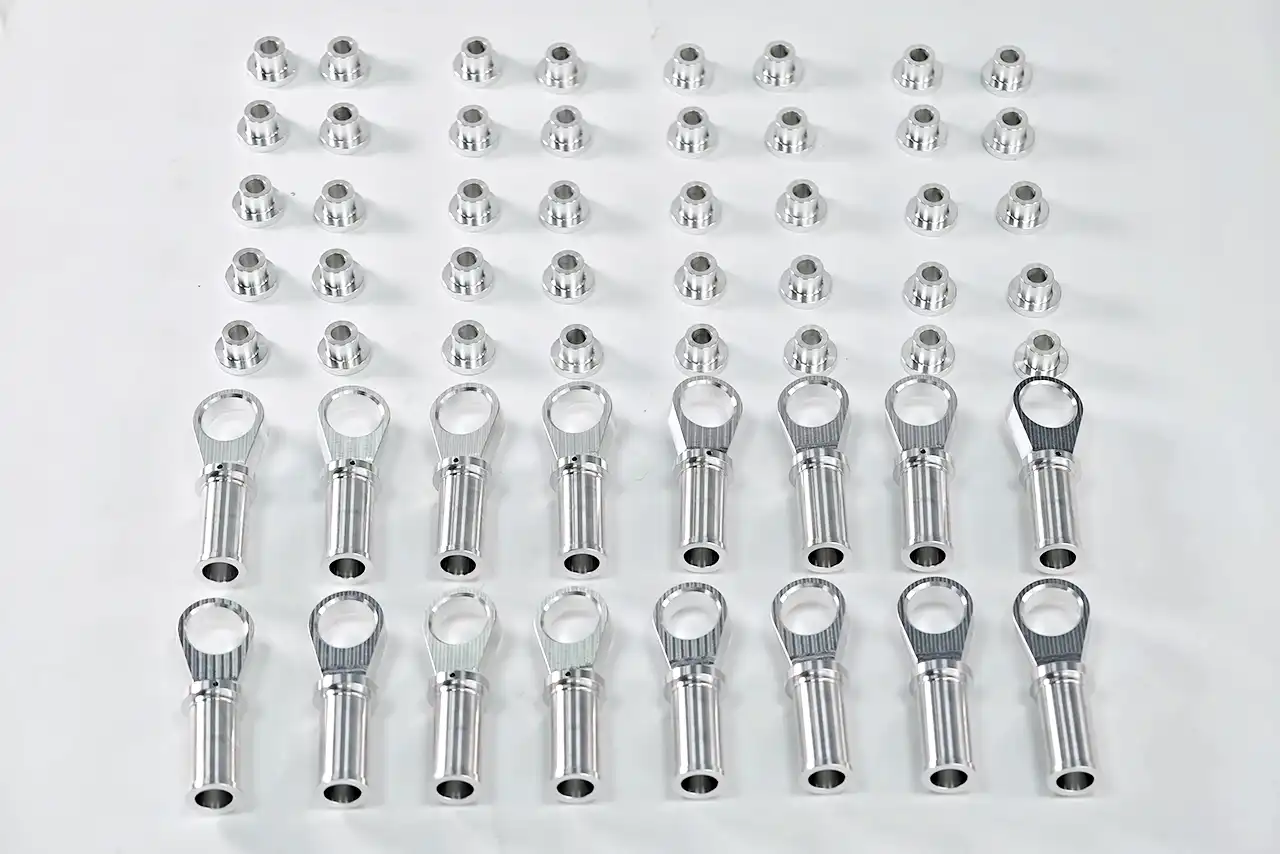 Precision machined low-volume metal parts with drilled features