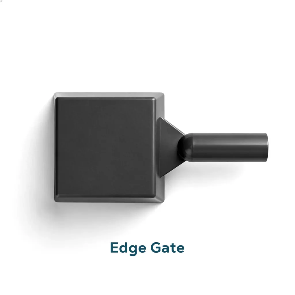 A top-down view of a rectangular plastic part with a cylindrical runner and a tapered triangular edge gate on the side.