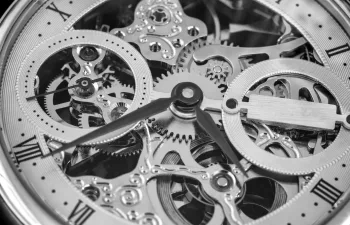 Meticulously turned watch gears symbolizing high-accuracy CNC turning