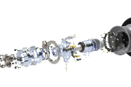 Exploded 3D CAD render of a custom CNC machined motorsport wheel hub assembly showing brake disc, planetary gear system, and wheel rim components.