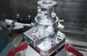 Custom CNC workholding fixture securely holding an aluminum component for precision CNC machining